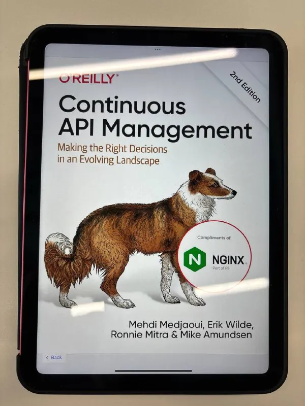 Обложка книги Continuous API Management, 2nd Edition на экране планшета